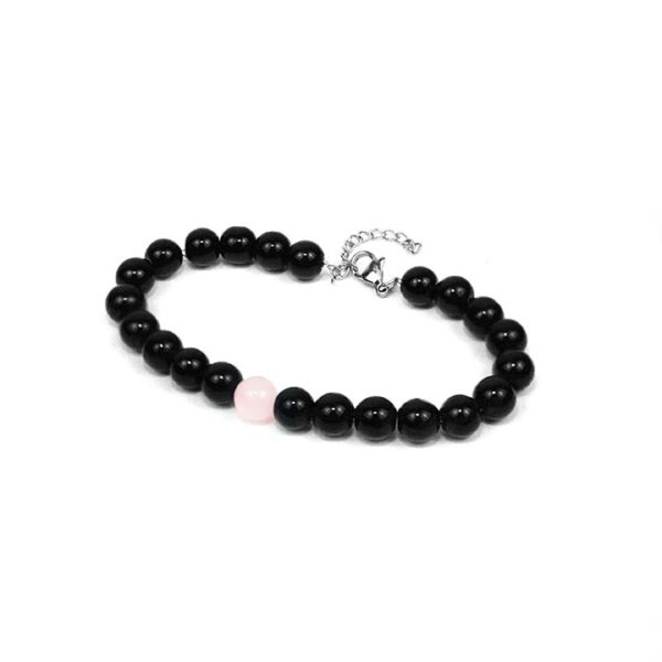 Beaded Rose Quartz Bracelet. Single rose quartz bead flanked by polished black glass beads.