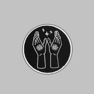 Occult Embroidery Patch. Iron on patch depicting two raised arms with eyes in the center of each palm.