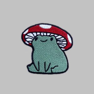 deep green frog with mushroom cap upon its head. Mushroom Frog embroidery patch